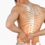 30 Jan 2015 --- Highlighted spine of man with back pain --- Image by © Wavebreakmedia LTD/Wavebreak Media Ltd./Corbis